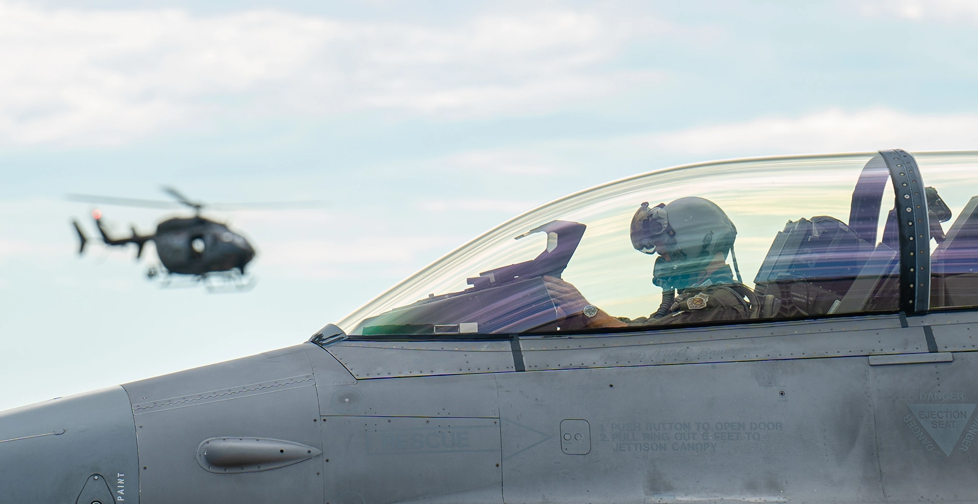 fighter jet pilot and helicopter